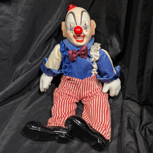 Vintage porcelain clown doll.
