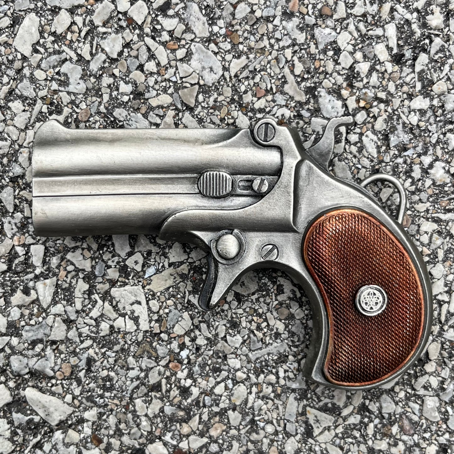 1978 Pistol belt buckle.