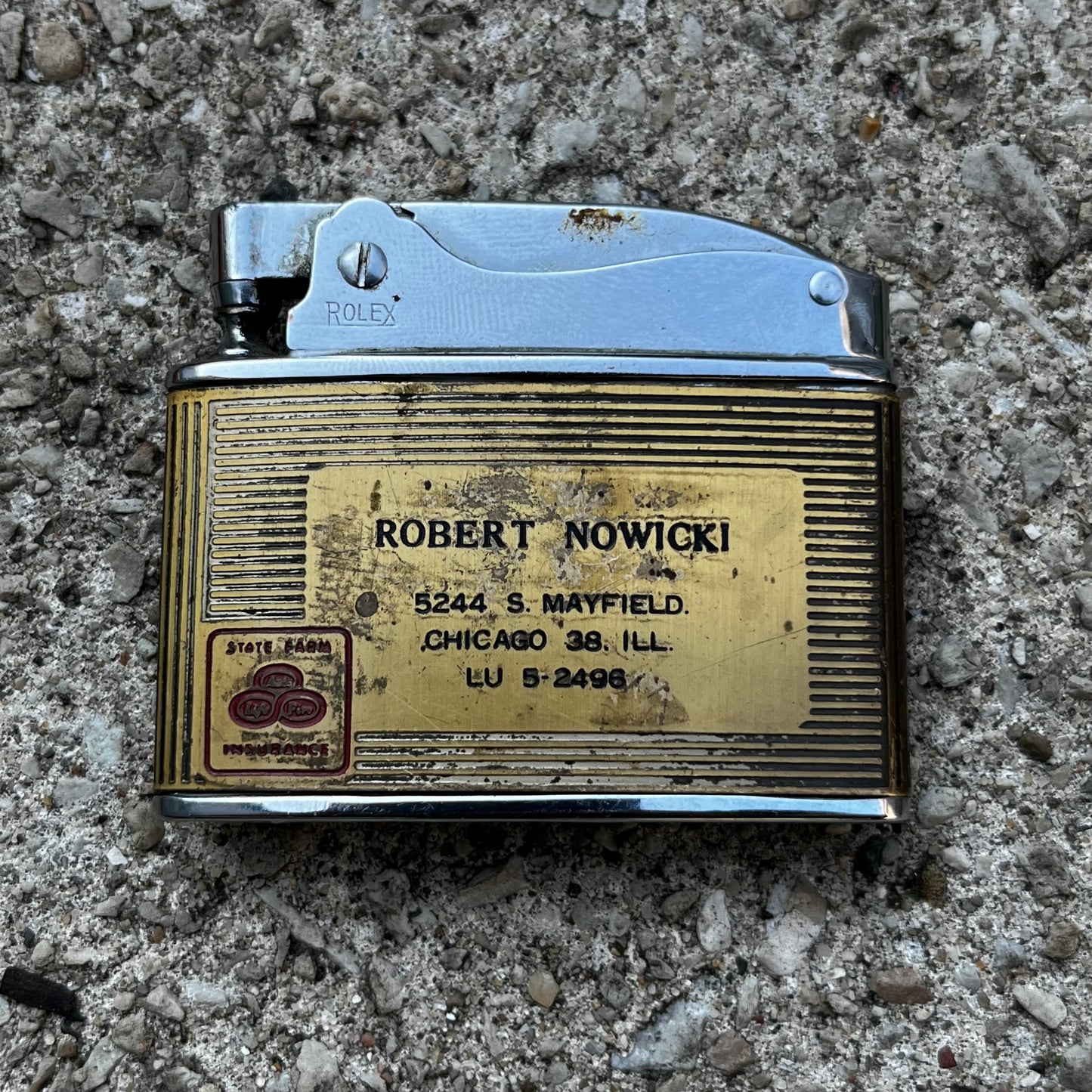 Vintage State Farm flat lighter.
