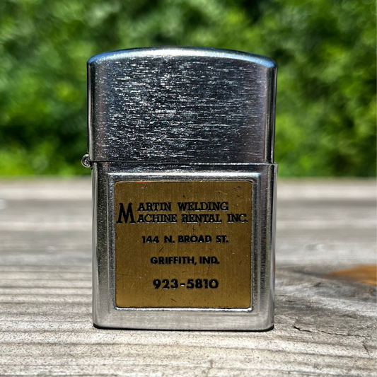 Vintage Martin machine flip rental lighter.