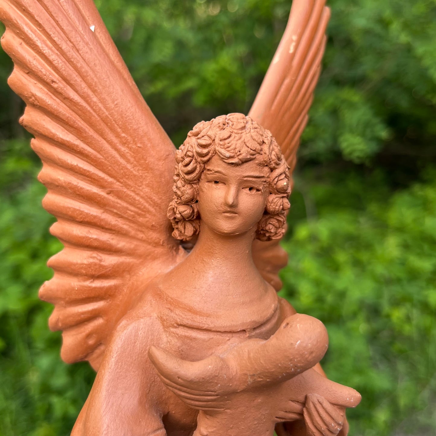 Vintage clay angel candle holder.
