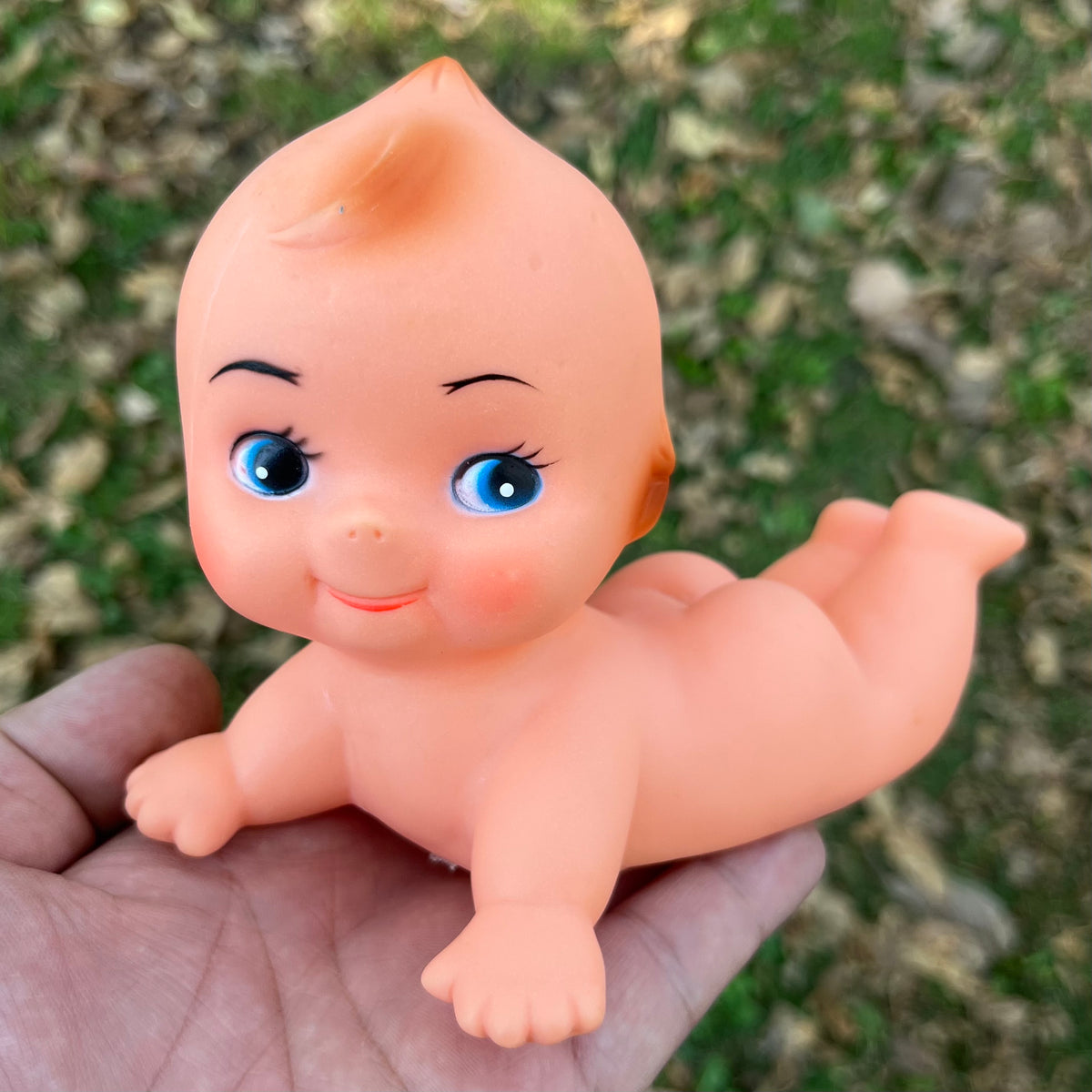 Vintage vinyl Kewpie.