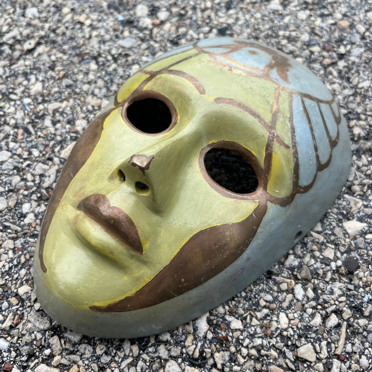 Vintage brass bird mask.
