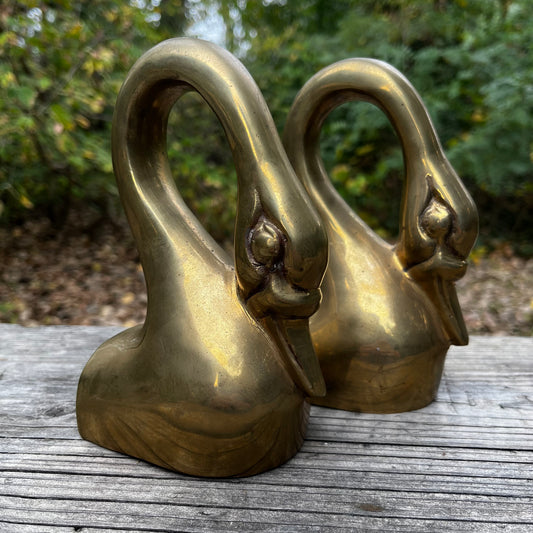 Vintage Brass swan book ends.