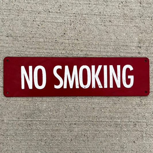 Vintage “No Smoking” metal sign.