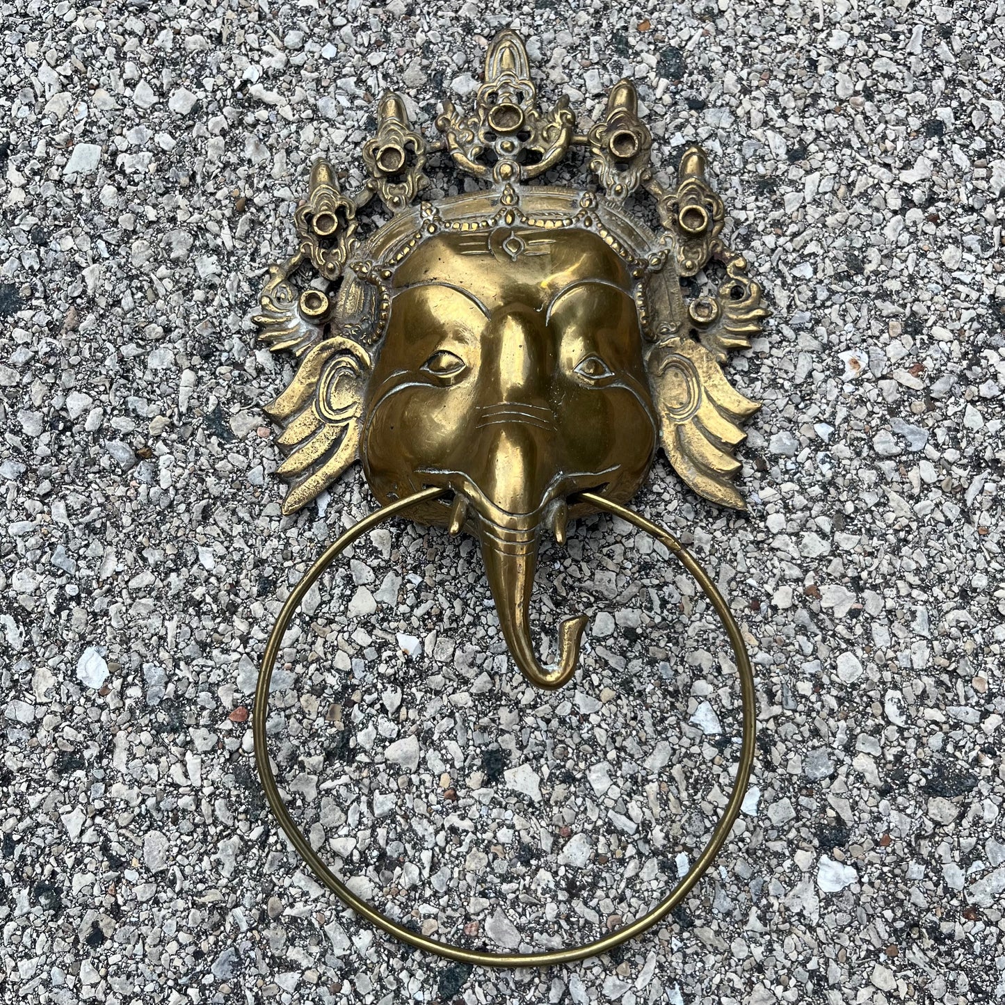 Vintage brass Ganesh cloth holder.