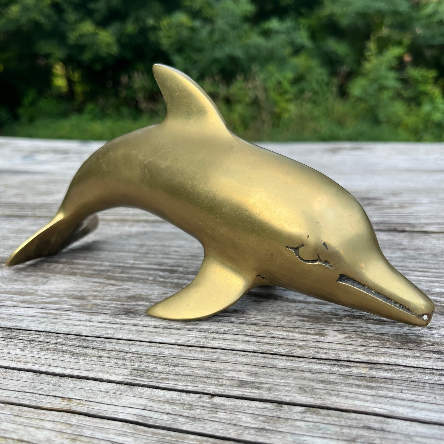 Vintage brass dolphin.