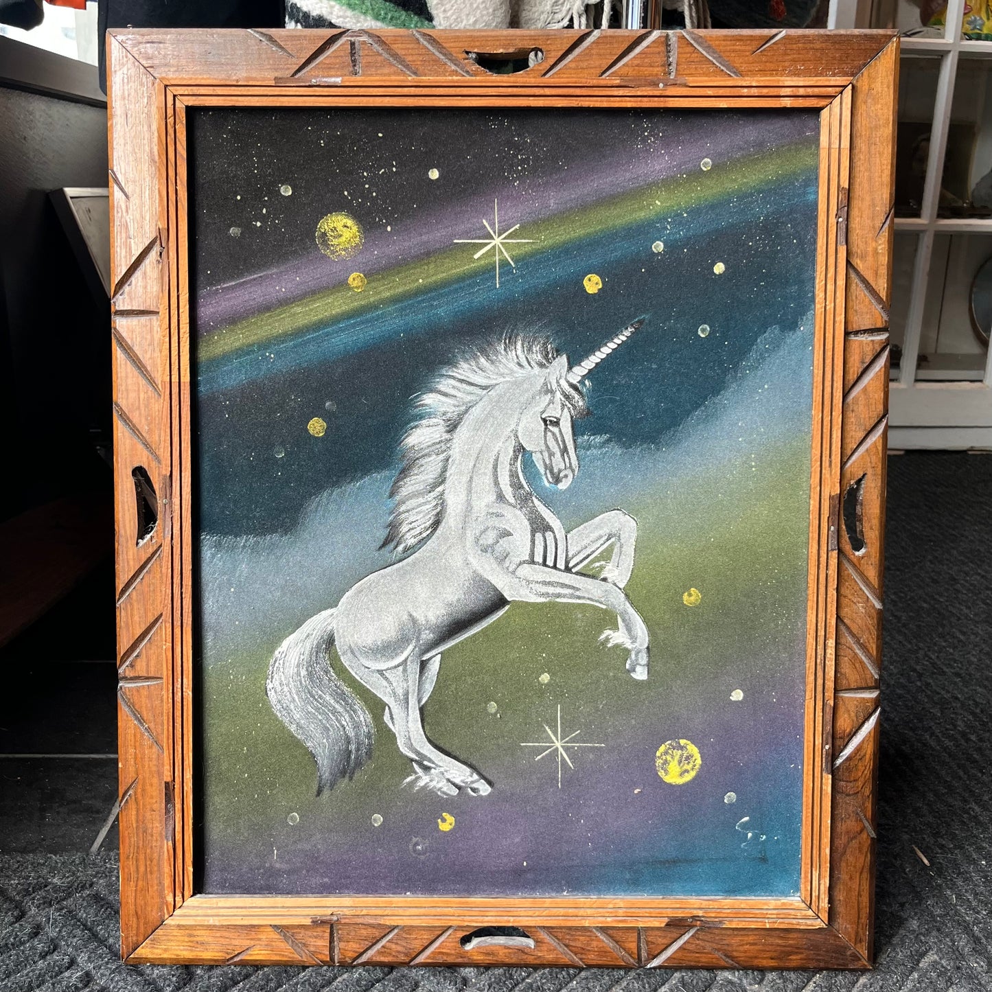 1970s Space unicorn on black velvet.