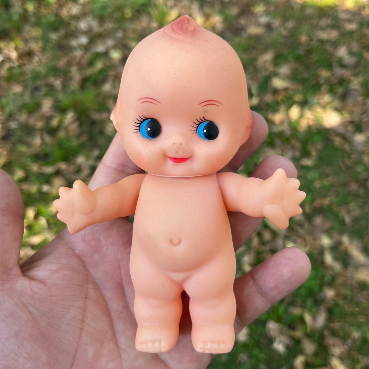 Vintage vinyl Kewpie.