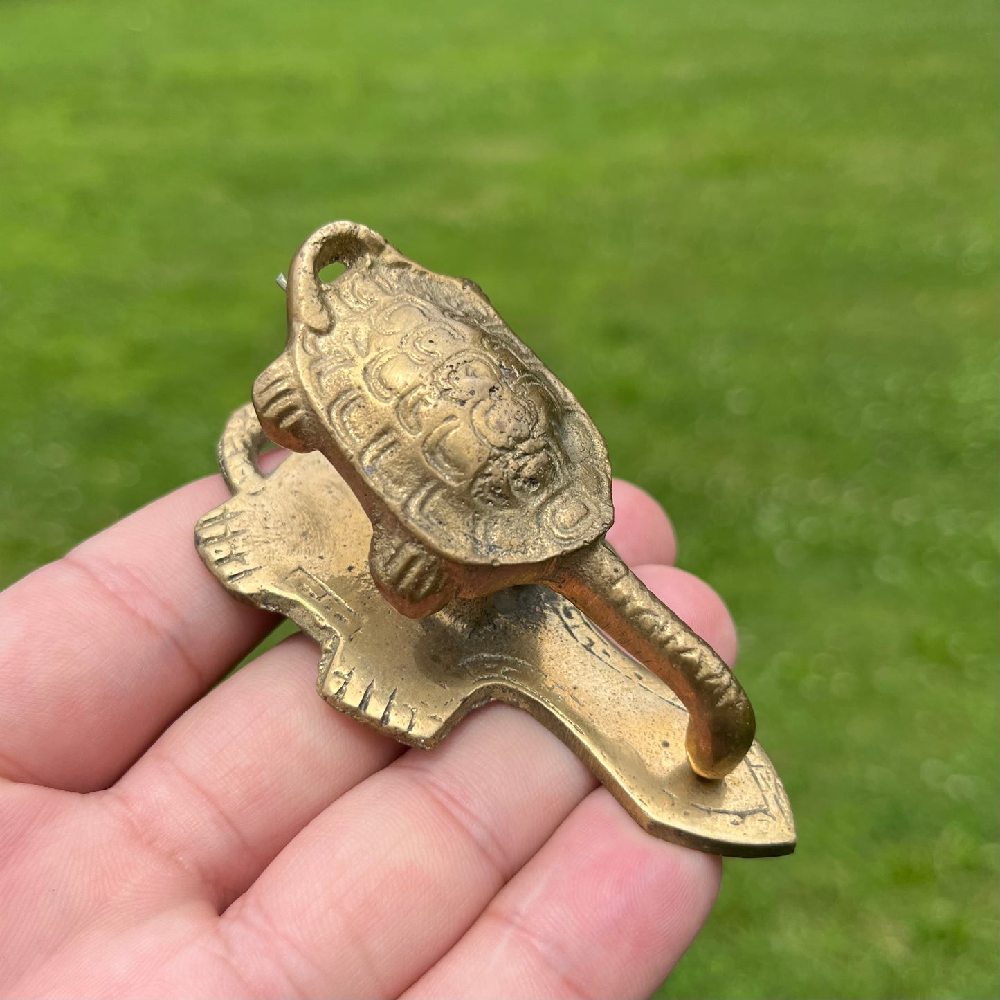 Vintage brass turtle clamp.