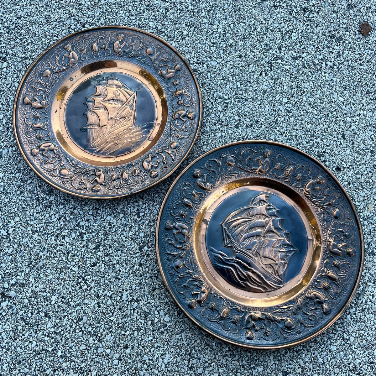 Vintage copper nautical plaque set.