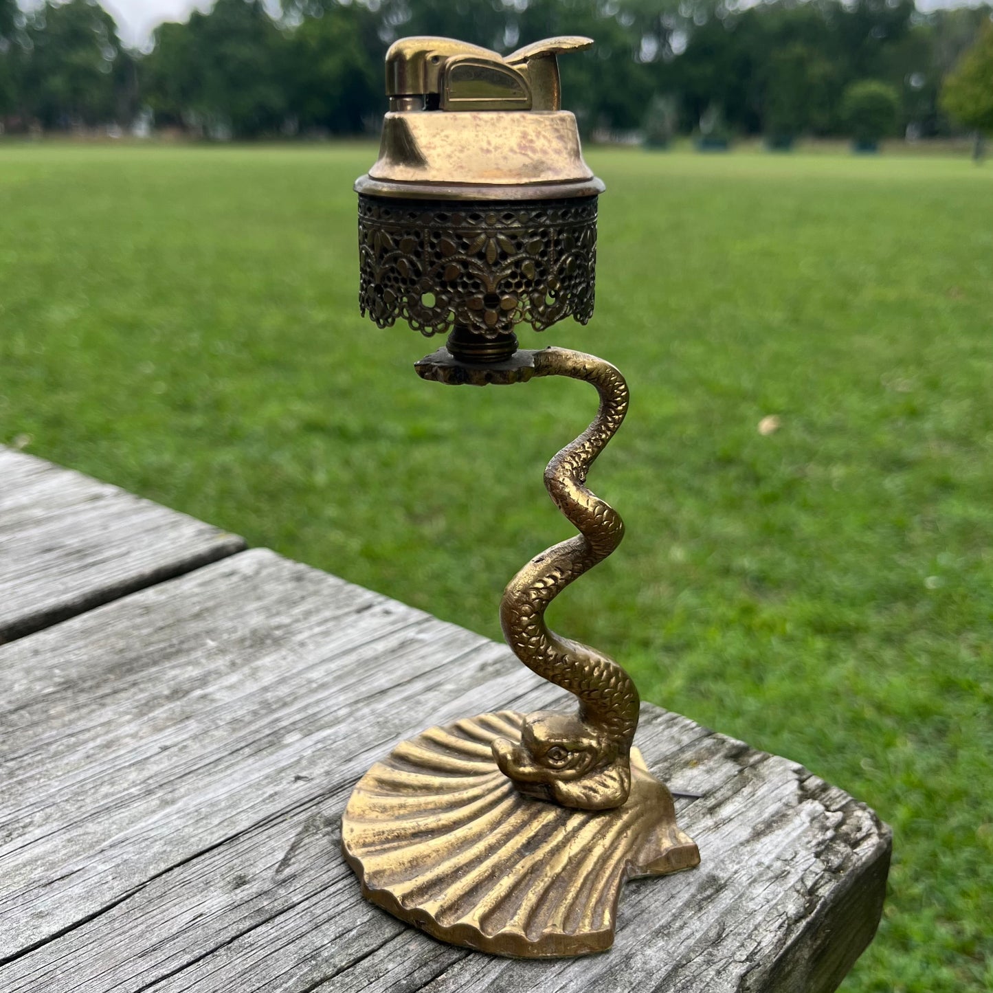 Rare 1950s brass serpent tabletop lighter.