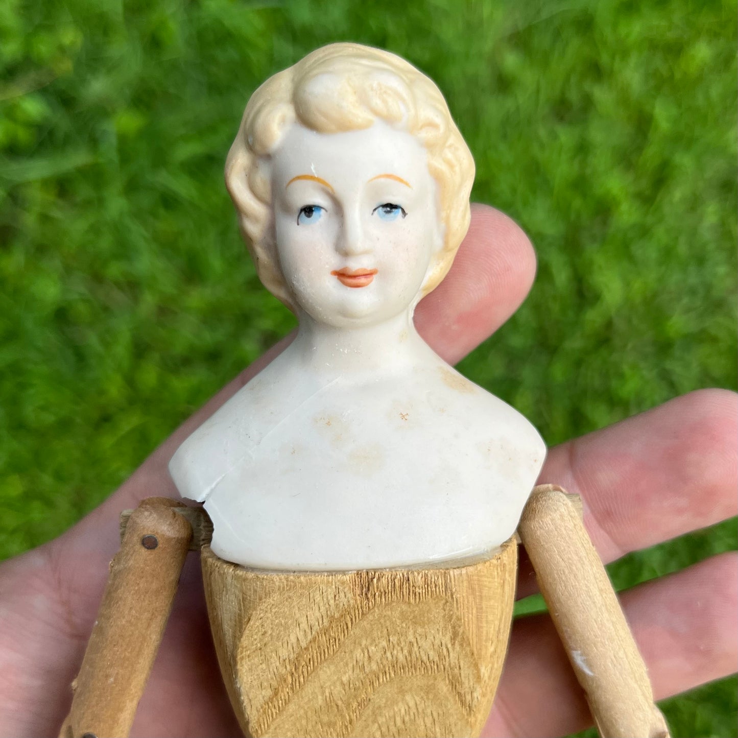 Vintage peg body bisque doll.