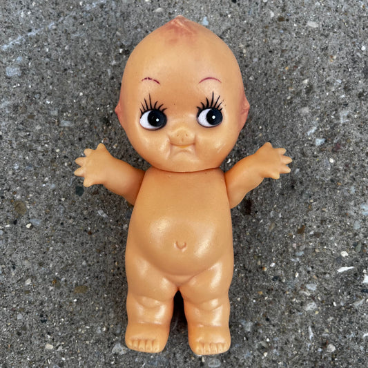 Vintage vinyl Kewpie doll.