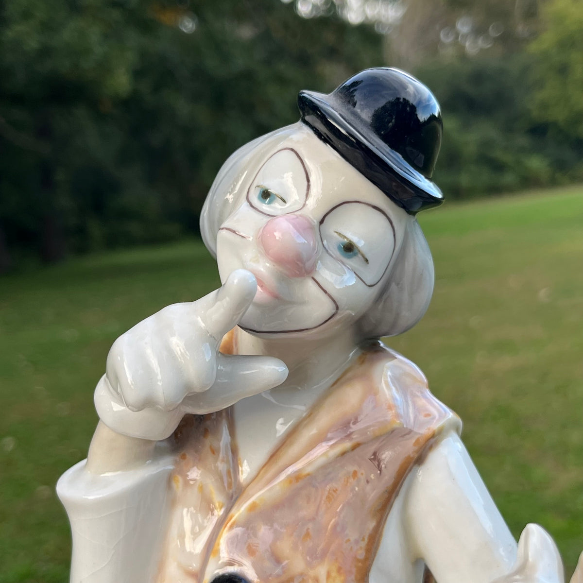 Vintage ceramic magician clown.