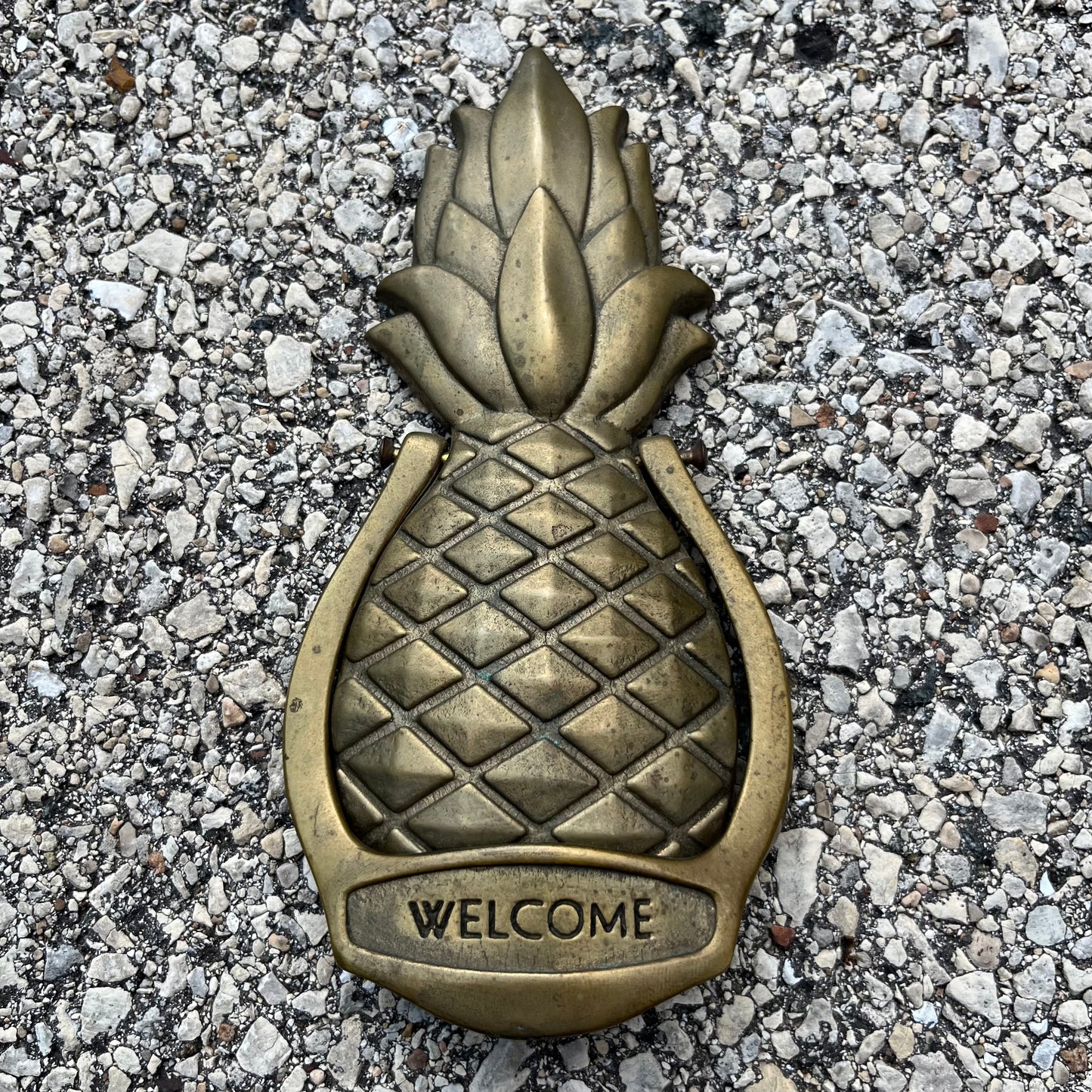 Vintage brass pineapple door knocker.