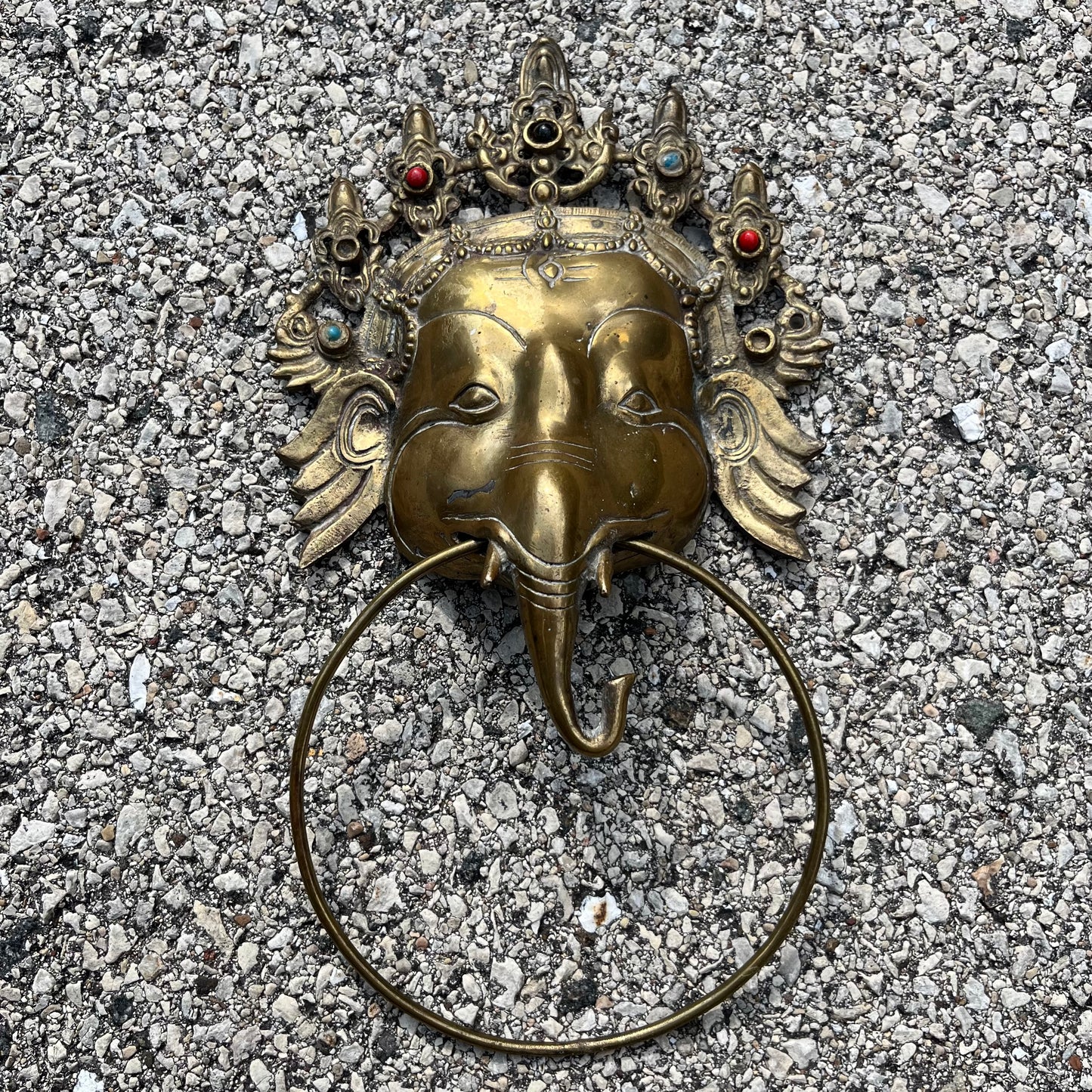 Vintage brass Ganesh cloth holder.