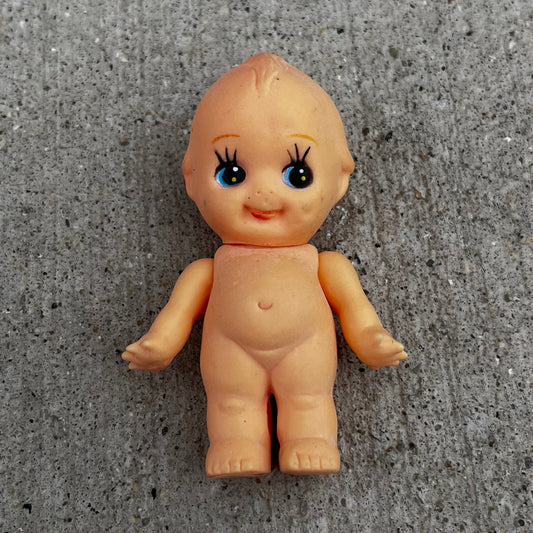 Vintage vinyl Kewpie doll.