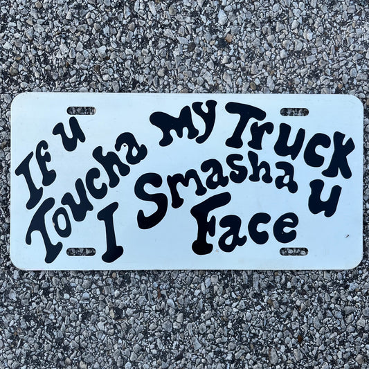 Vintage novelty license plate.