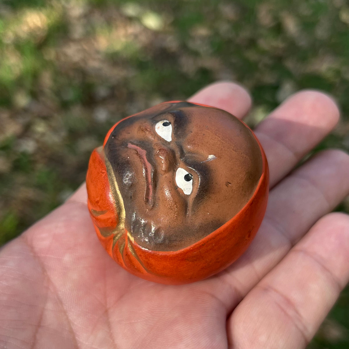 Vintage ceramic Daruma doll.