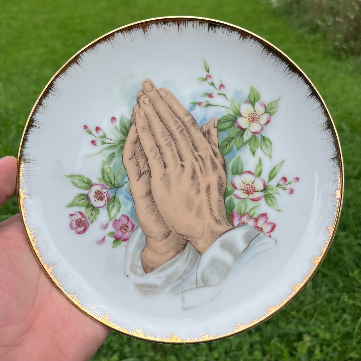 Vintage praying hands plate.