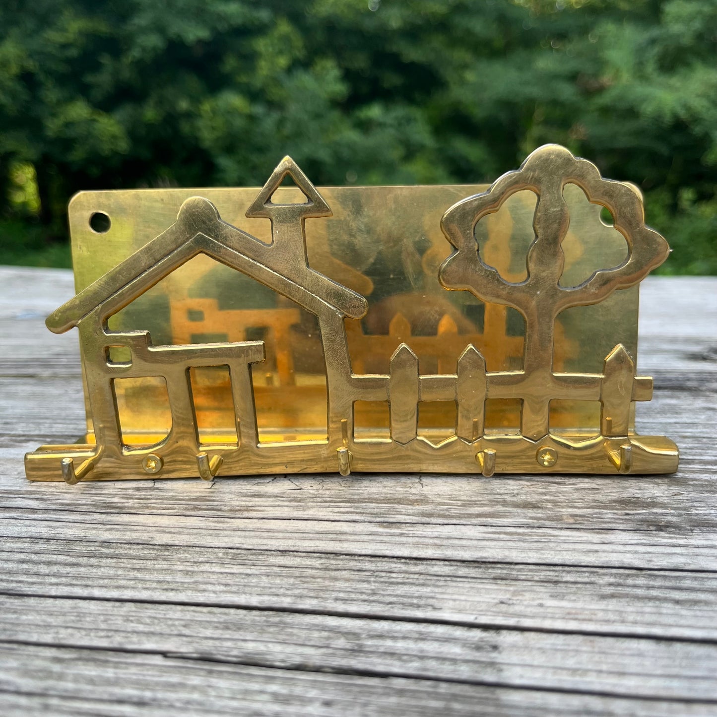 Vintage brass house key holder.