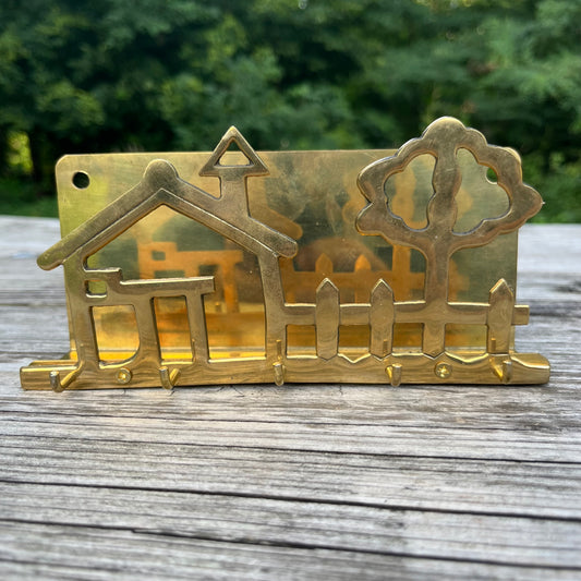 Vintage brass house key holder.