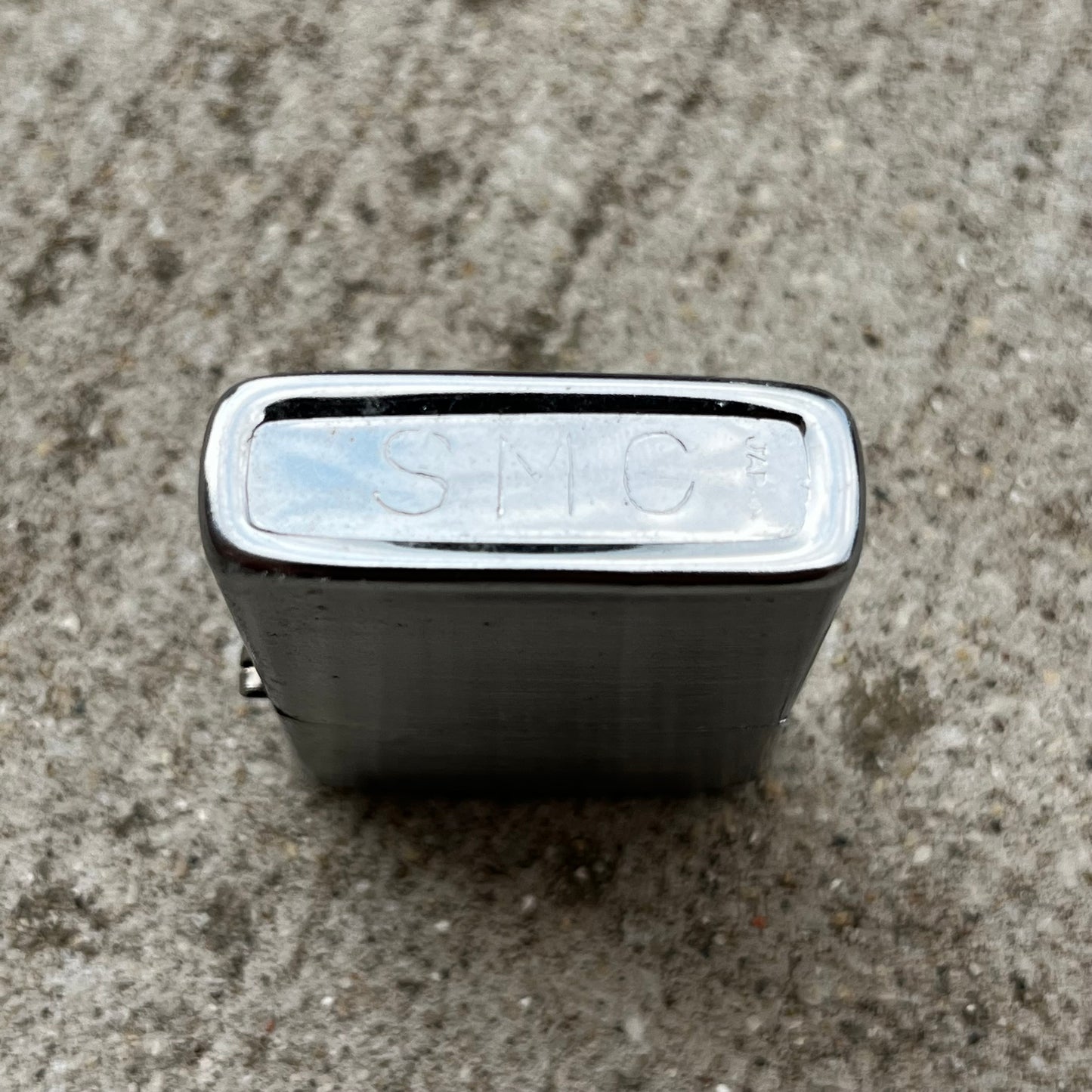 Vintage S.M.C. flip lighter.
