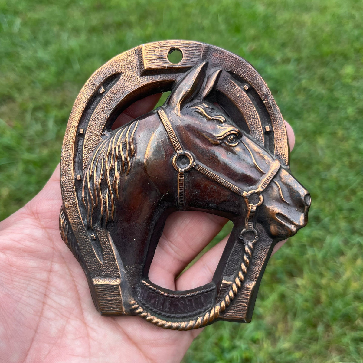 Vintage copper lucky horseshoe plaque.