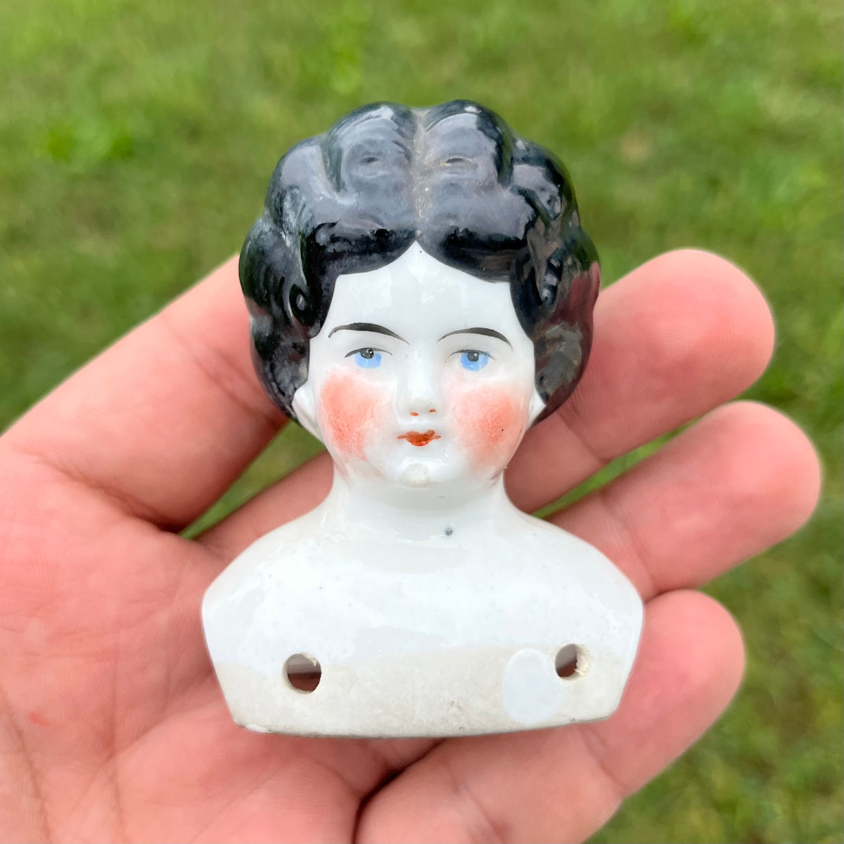 Vintage bisque doll head.