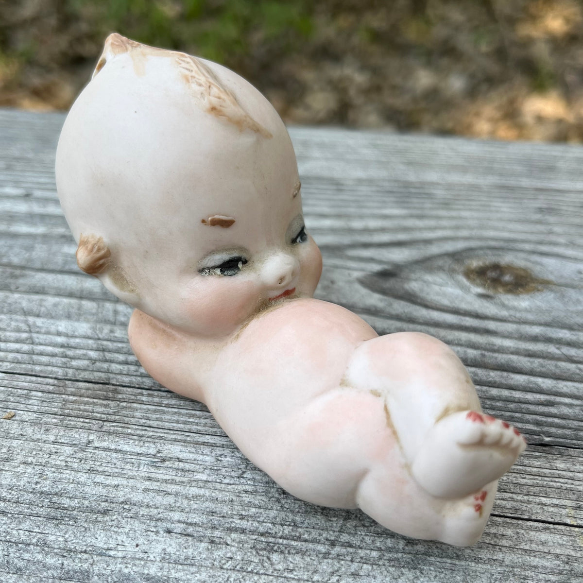 Vintage sleepy Kewpie.