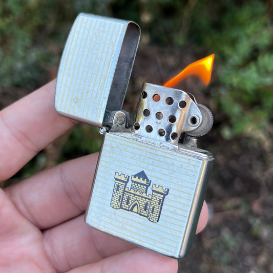 Vintage White Castle flip lighter.