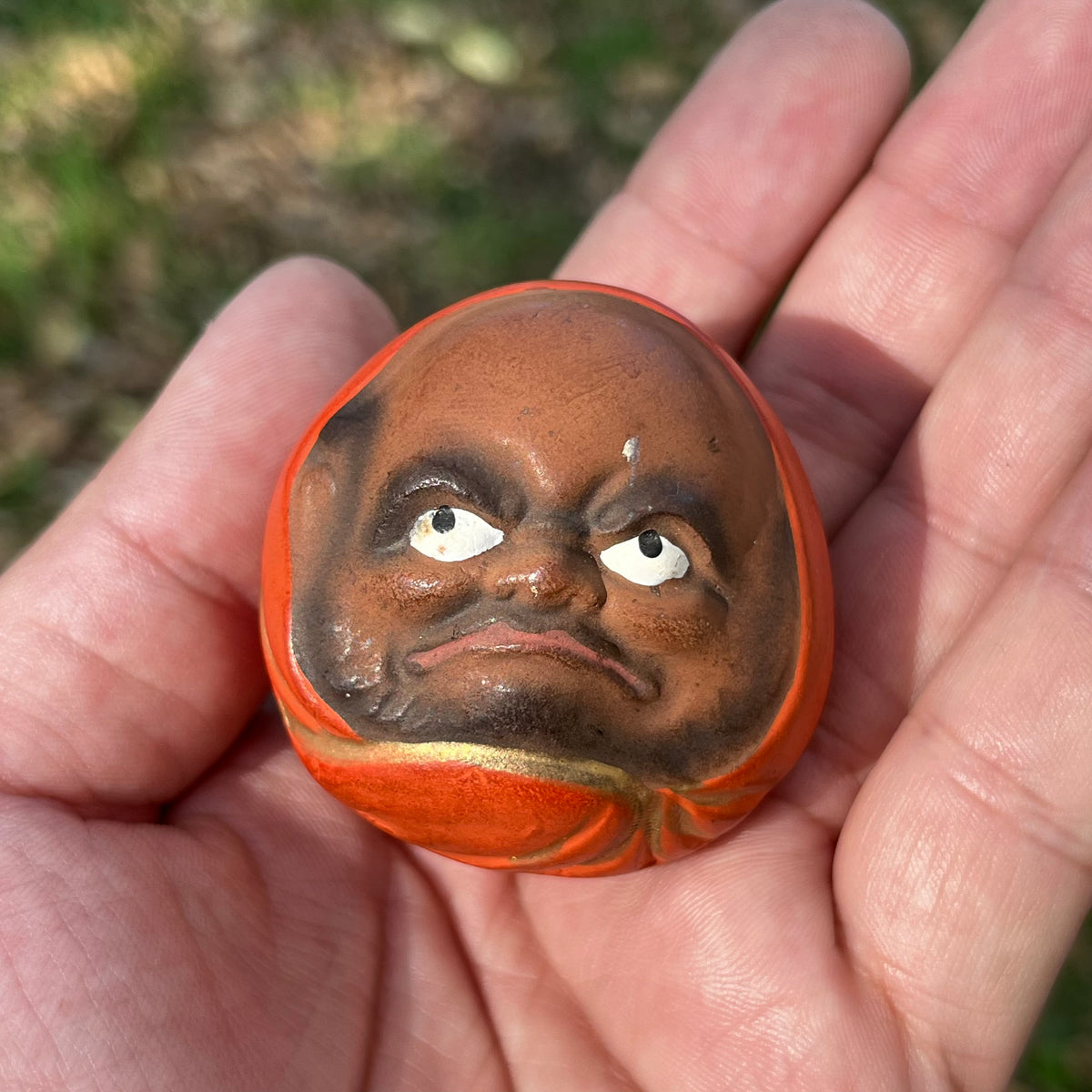 Vintage ceramic Daruma doll.