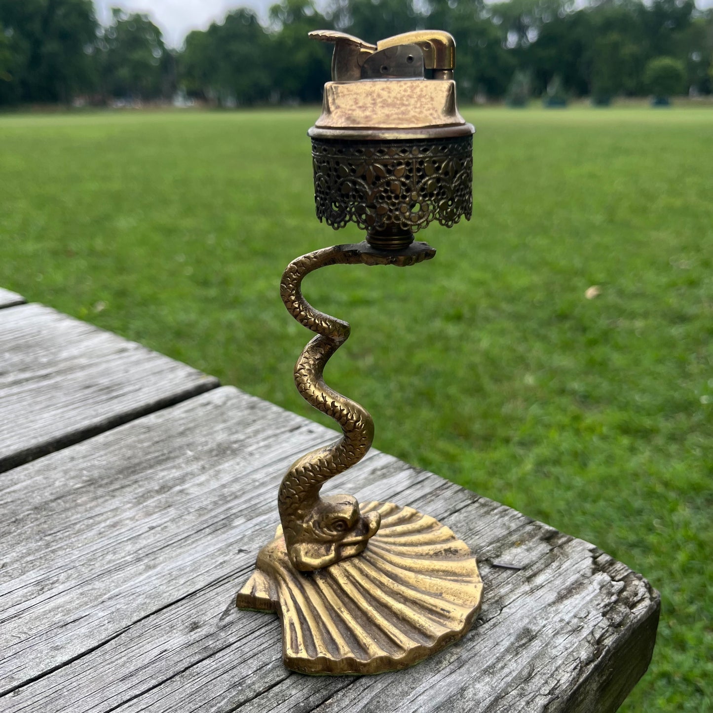 Rare 1950s brass serpent tabletop lighter.