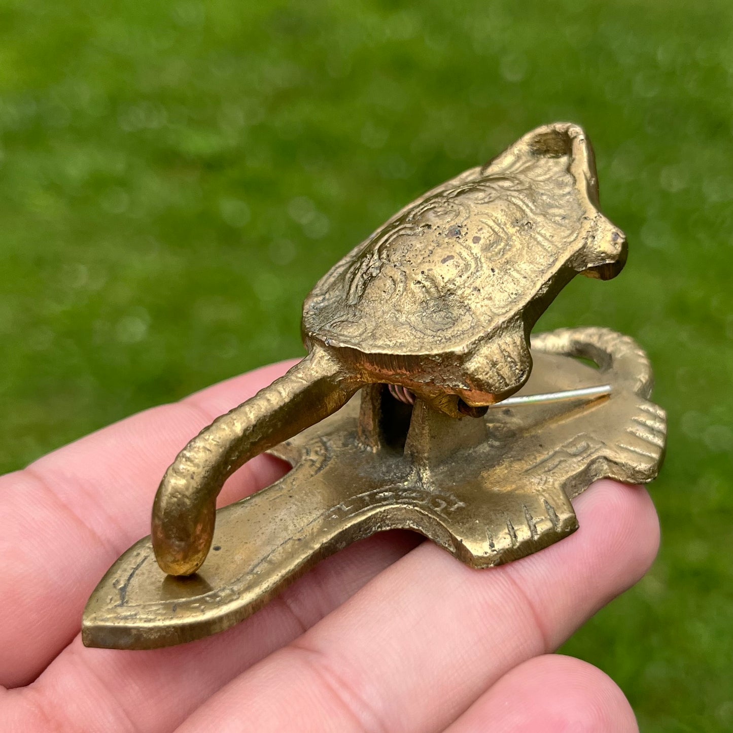 Vintage brass turtle clamp.