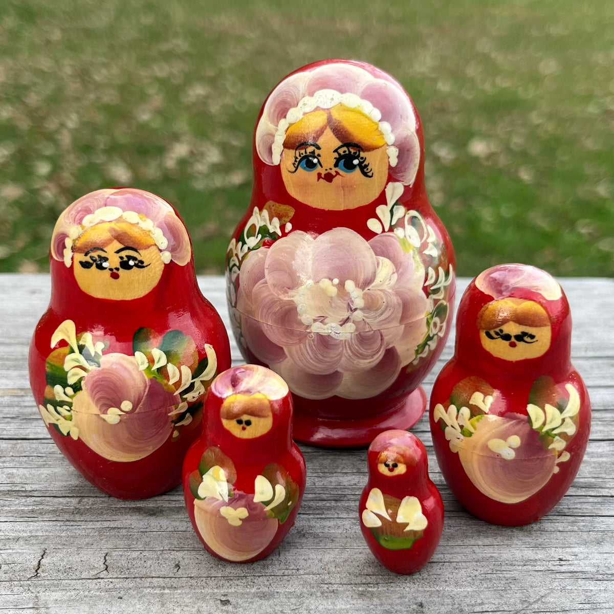 Vintage wooden nesting doll set of five.