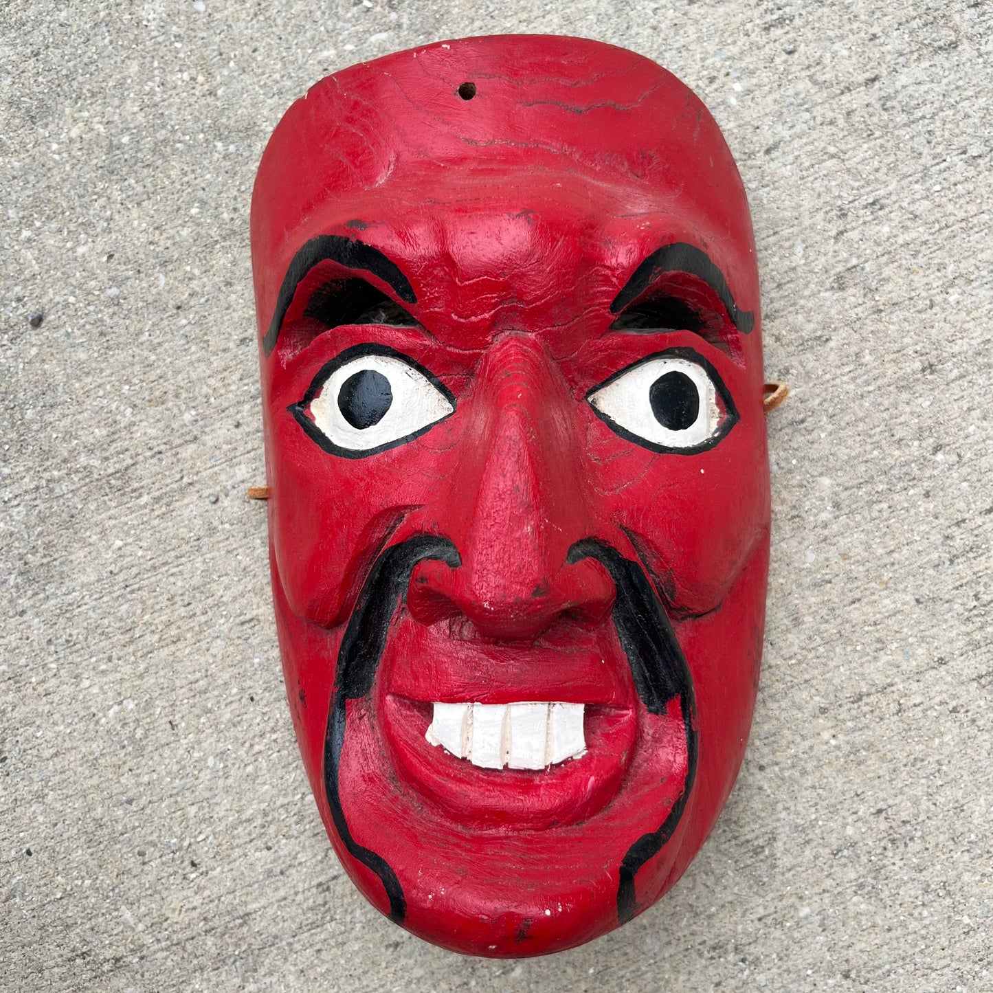 Vintage red demon mask.