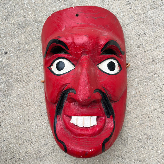 Vintage red demon mask.