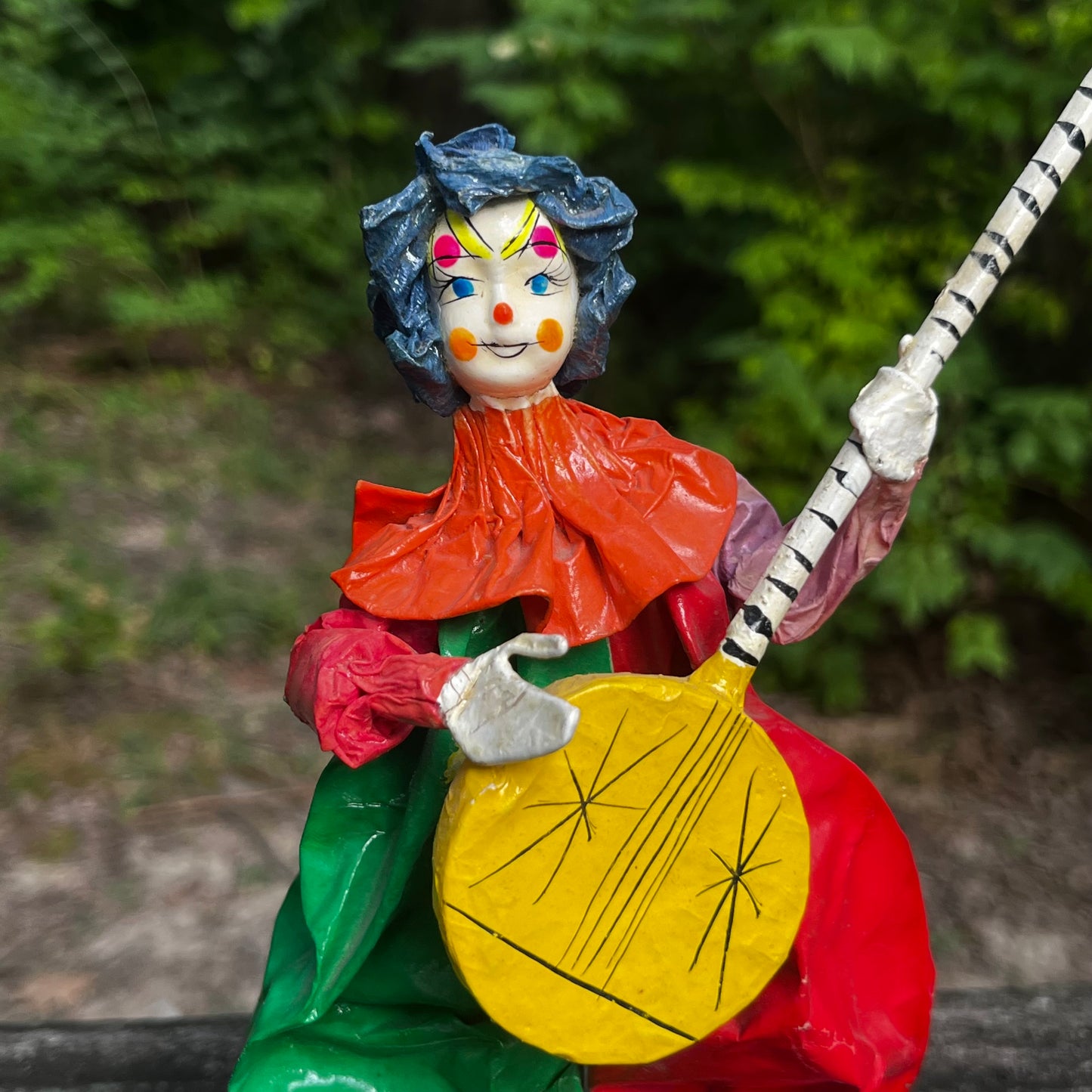 Vintage paper mache clown.