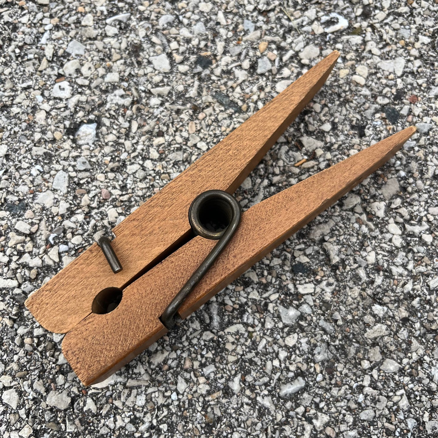 Vintage oversized “complaints” clothespin.