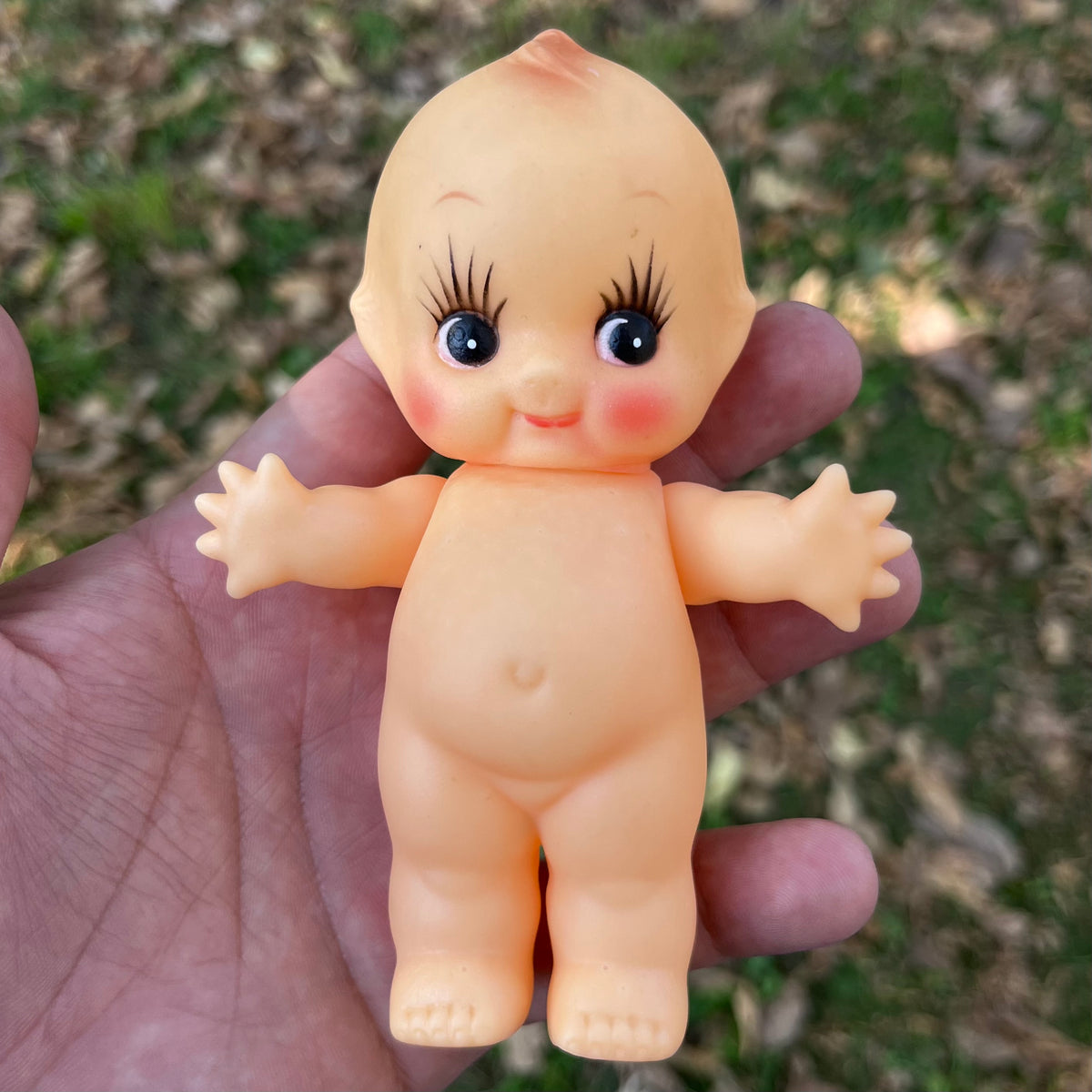 Vintage vinyl Kewpie.