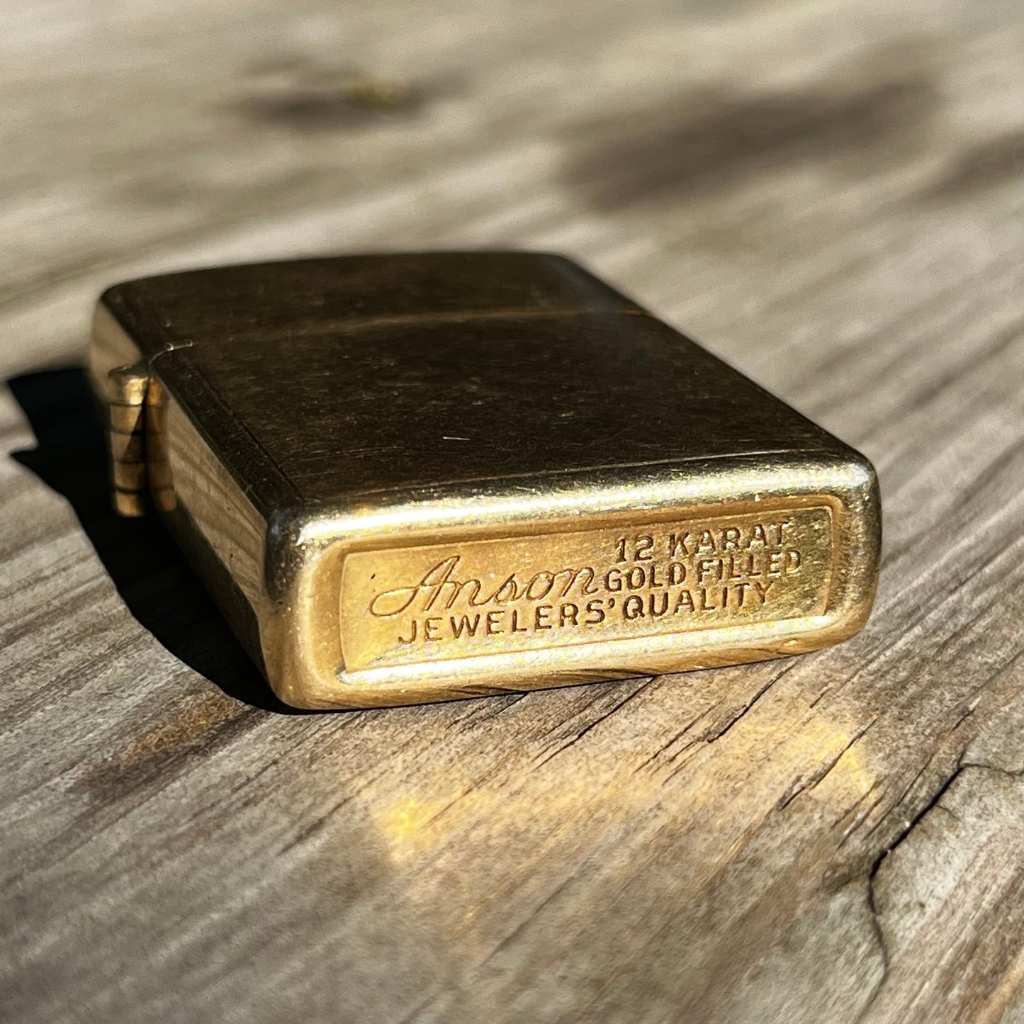 1960s 12 Karat gold filled Anson flip lighter.