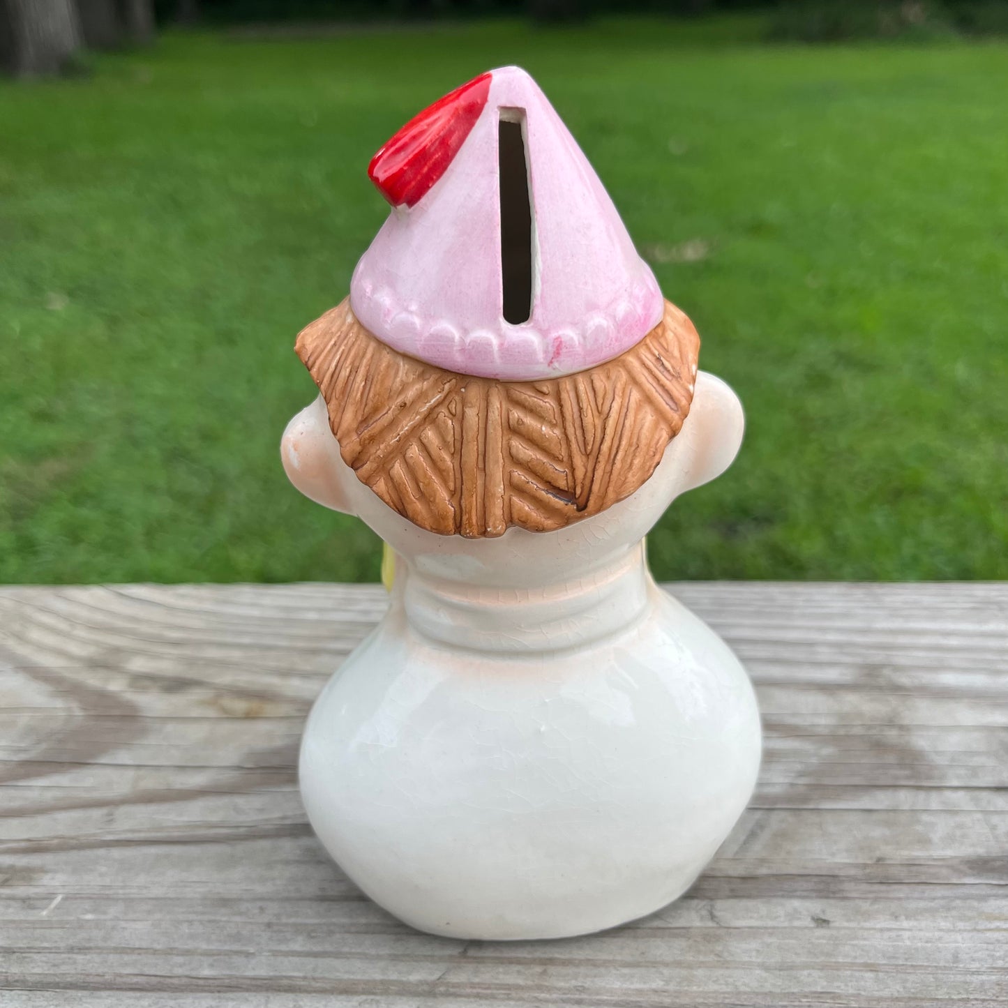 Vintage ceramic clown coin bank.