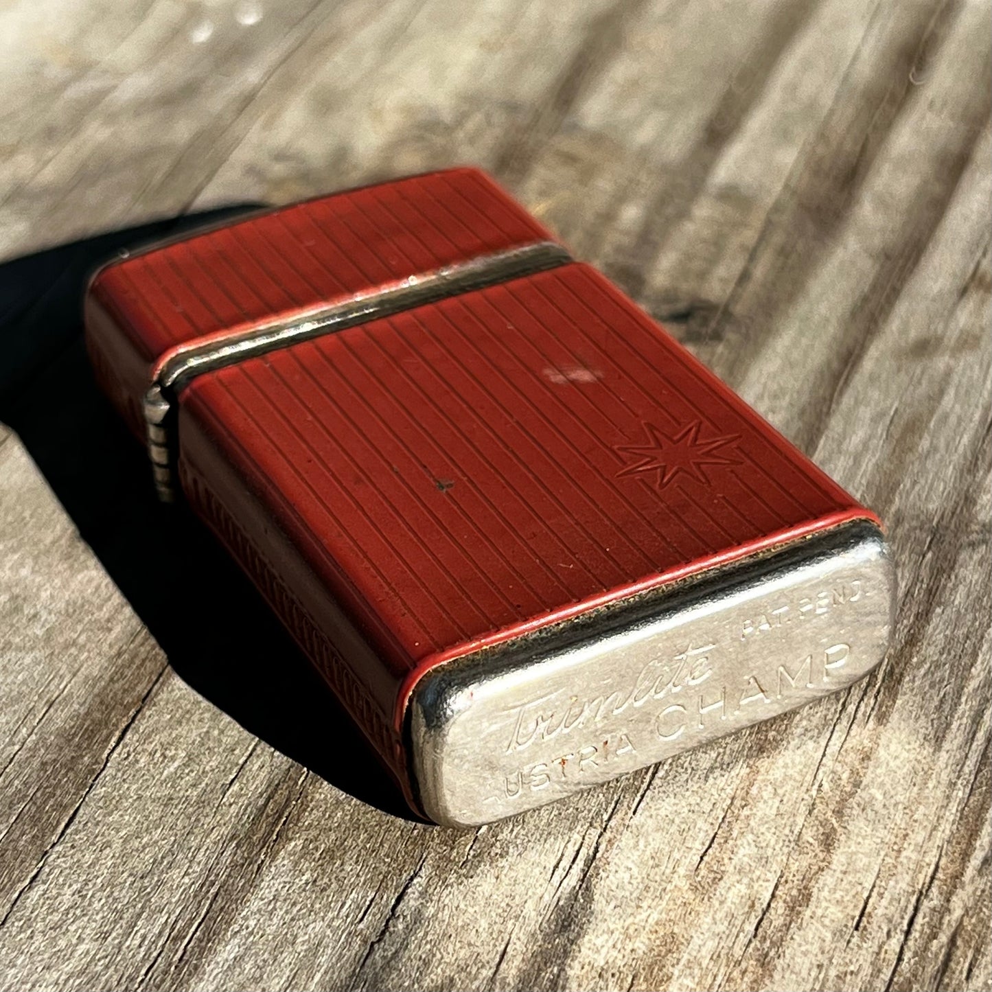 1960s Trimlite Champ flip lighter.