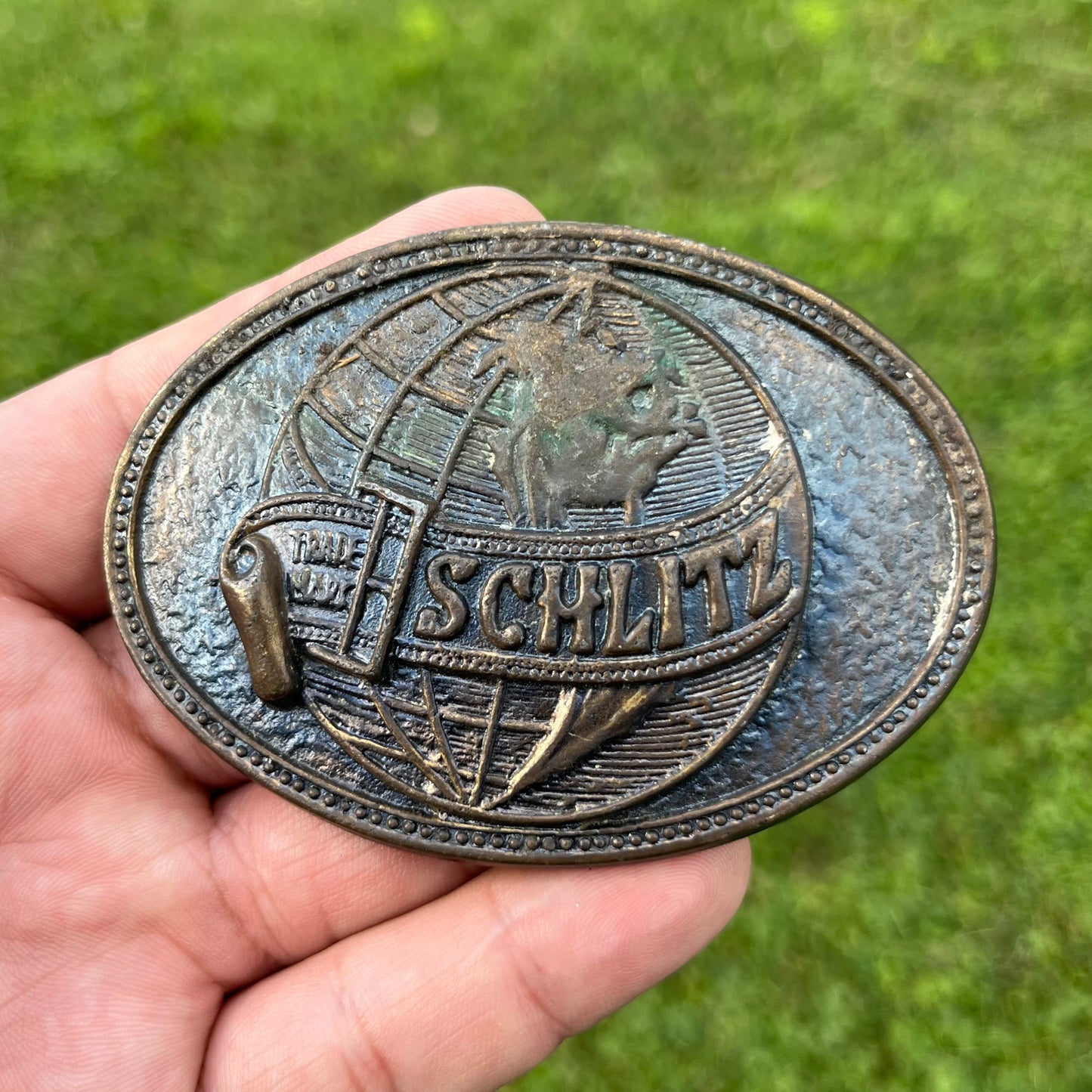 1970s Schlitz belt buckle.