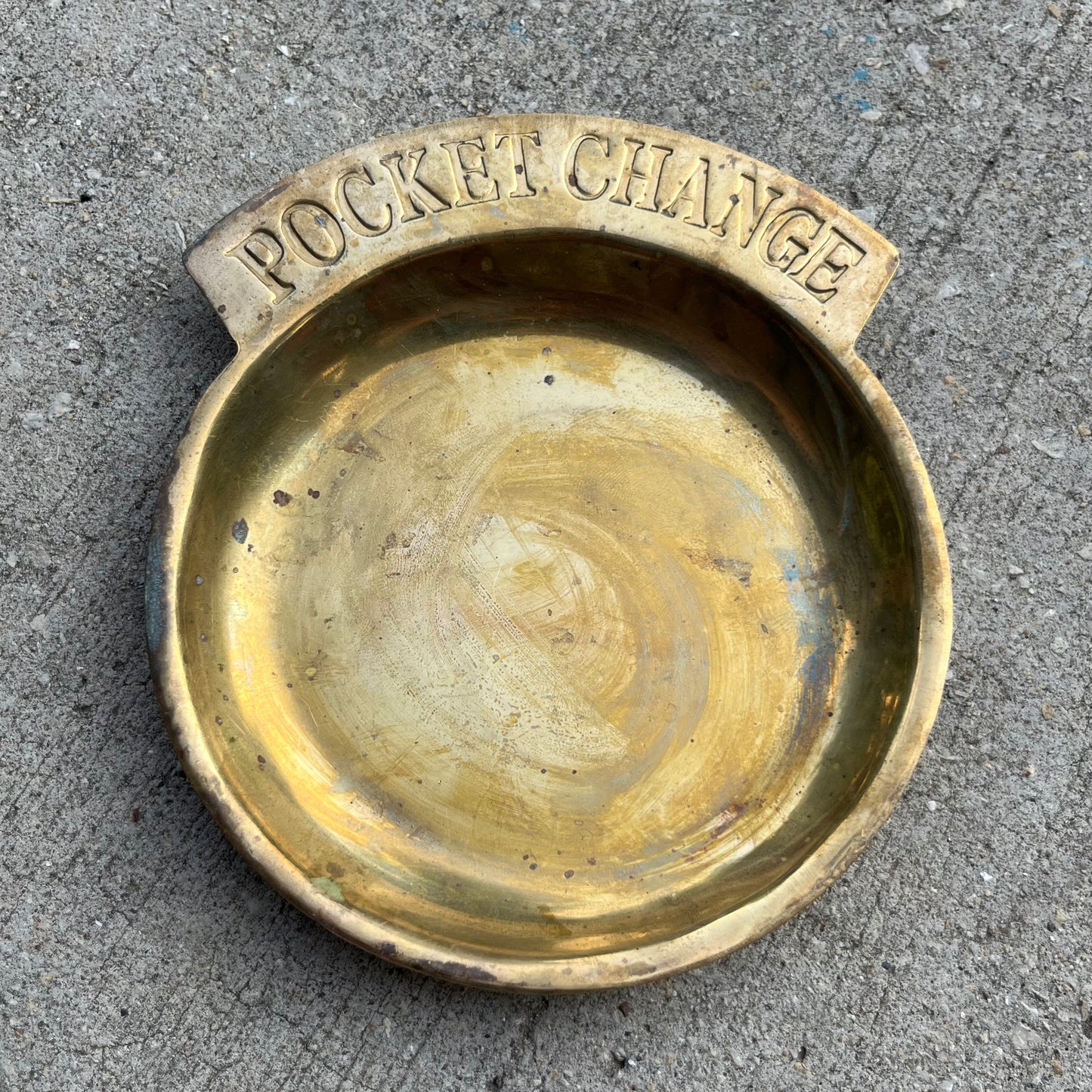 Vintage brass pocket change dish.