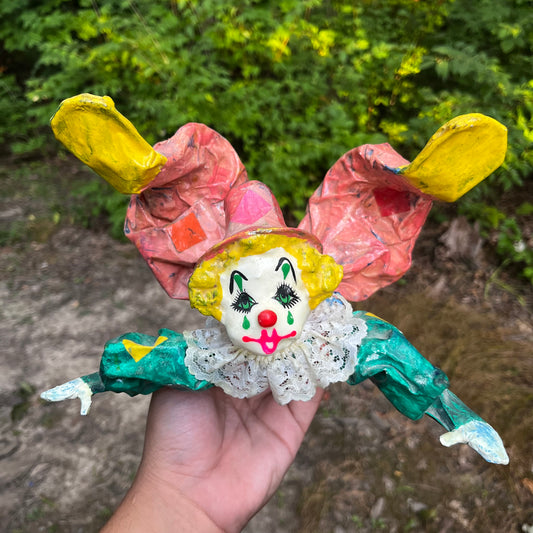 Vintage paper mache clown.