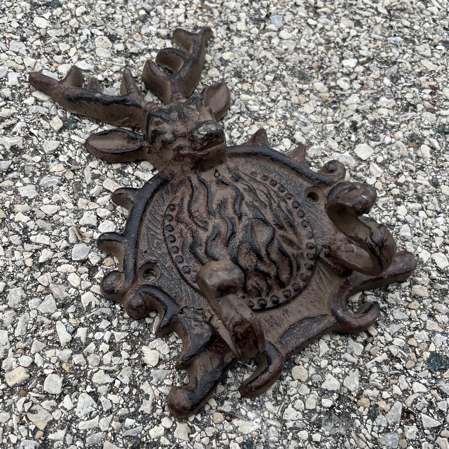 Vintage cast iron deer hooks.