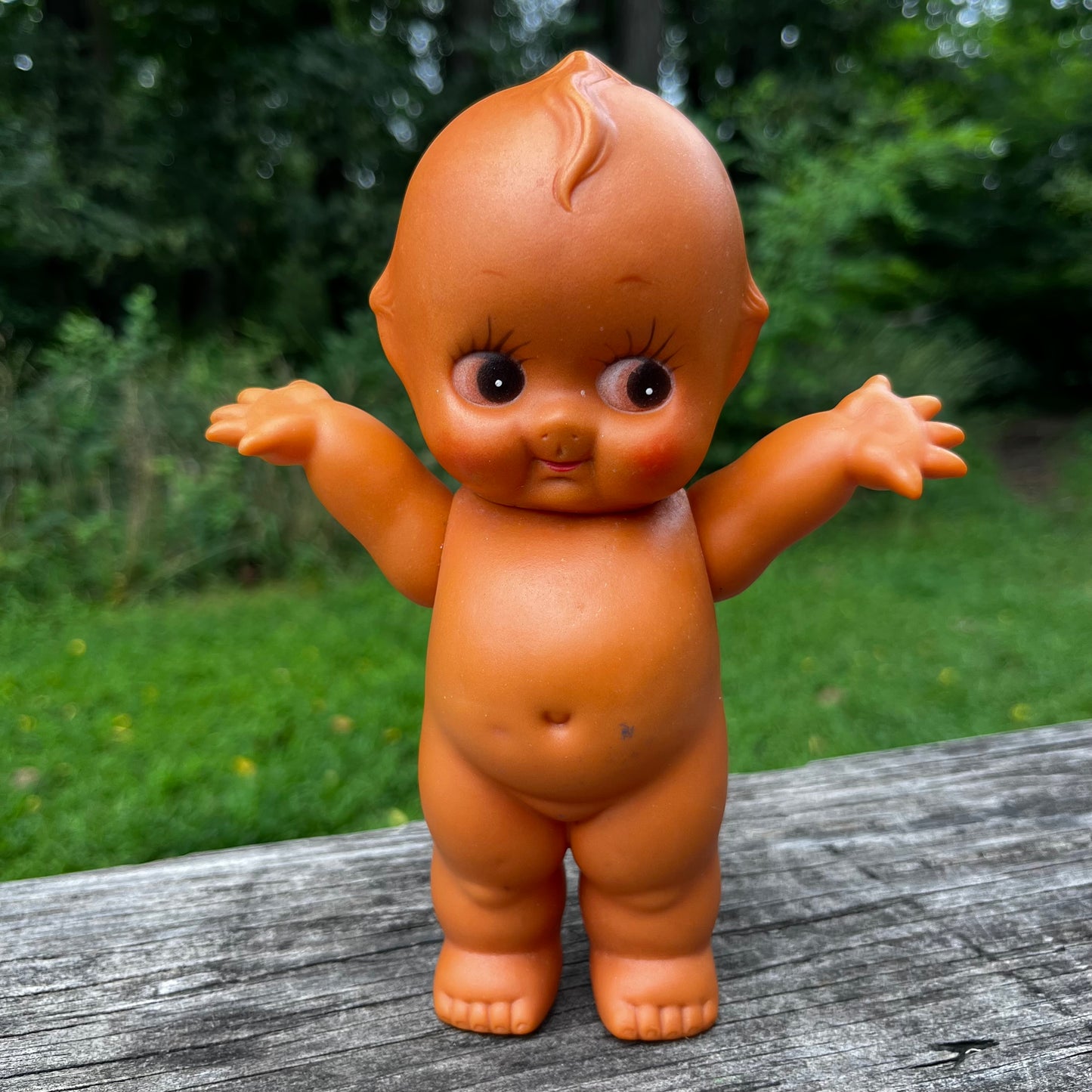 Vintage vinyl Kewpie.