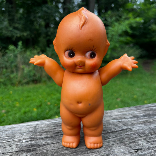 Vintage vinyl Kewpie.